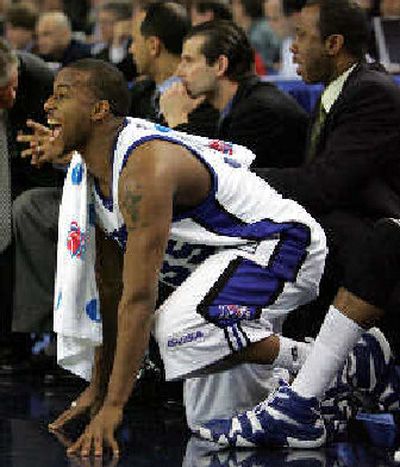 
Memphis' Darius Washington Jr., reacts from the bench during the second half of his team's win. 
 (Associated Press / The Spokesman-Review)