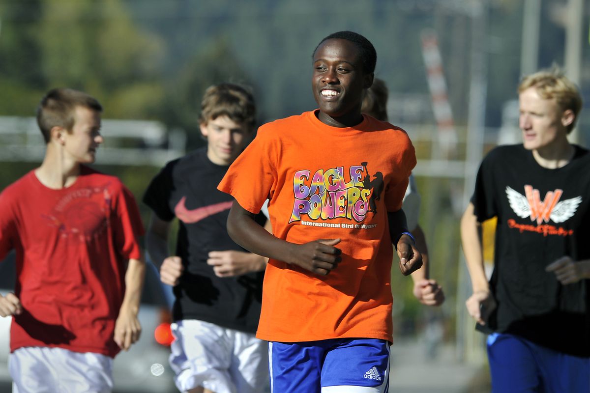 West Valley cross country runner, Richard Nyambura takes off for a practice run with his teammates on Tuesday at the school. (Dan Pelle / The Spokesman-Review)