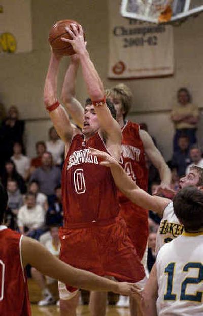 
That's not a bull's-eye on the chest of No. 0 Sandpoint post Ben Mitchell, but the 6-foot-4 senior is routinely targeted by opposing defenses. 
 (Tom Davenport/ / The Spokesman-Review)
