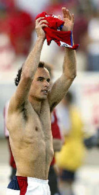 
USA midfielder Landon Donovan acknowledges the crowd after the win. 
 (Associated Press / The Spokesman-Review)