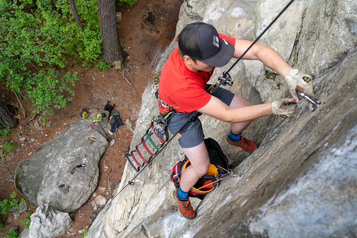 Zach Turner, with the Bower Climbing Coalition, replaces old bolts at the Dishman Hills climbing area.  (Courtesy of BCC)