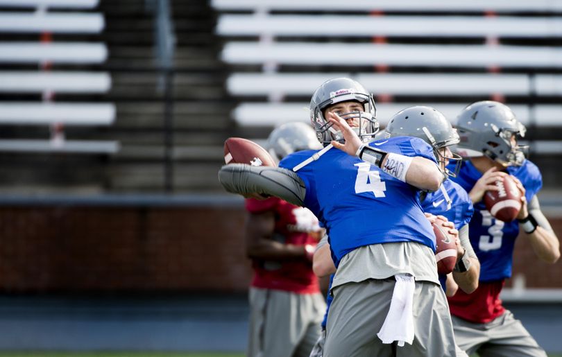 WSU quarterback Luke Falk throws the ball during practice on Thursday, March 31, 2016, at Martin Stadium in Pullman, Wash. (Tyler Tjomsland / The Spokesman-Review)