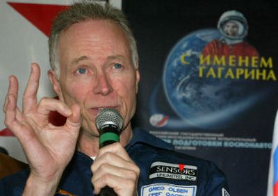 Millionaire scientist Gregory Olsen gestures at a news conference last month.
(Associated Press / The Spokesman-Review)