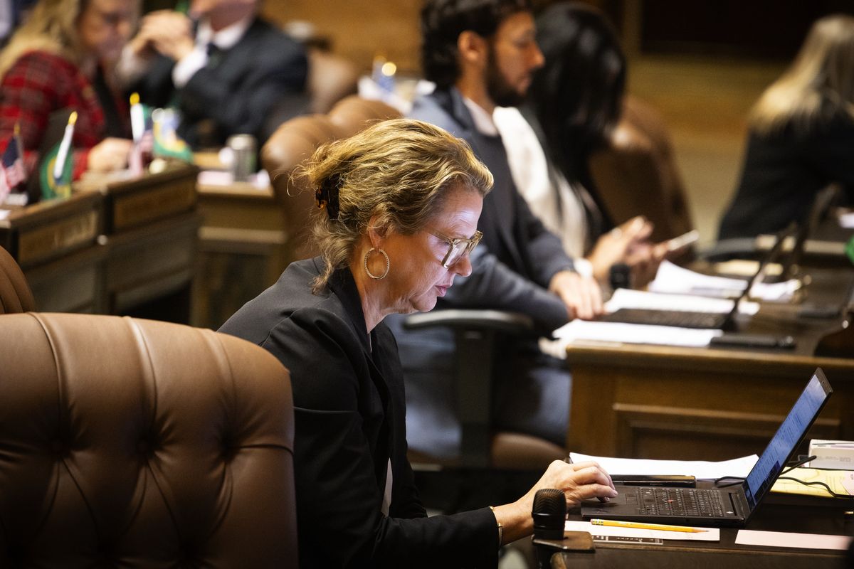 Rep. Amy Walen, D-Kirkland, is seen on the House floor before debate beings on the ‘millionaires tax’ proposal, Monday afternoon, March 9, 2026, in Olympia. Walen is expected to vote against it.  (Ken Lambert/Seattle Times)