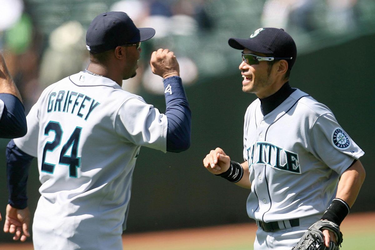 Ichiro Suzuki, right, and Ken Griffey Jr. teamed up in Seattle two years after the pair took part in one of the most memorable All-Star Games in Major League Baseball history. (Tribune News Service)