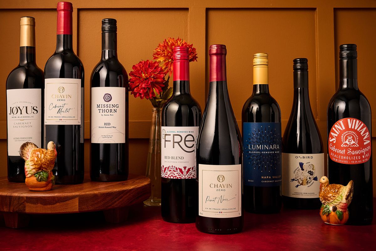 From left, Jøyus Cabernet Sauvignon; Chavin Zéro Cabernet Merlot; Missing Thorn Red Blend; Fre Red Blend; Chavin Zéro Pinot Noir; Luminara Cabernet Sauvignon; Oddbird Grenache Syrah Mourvèdre; Saint Viviana Cabernet Sauvignon.  (Photos by Lauren Bulbin; food styling by Lisa Cherkasky/The Washington Post)