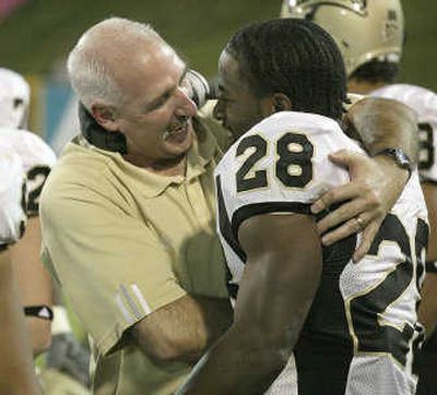 Vandals running back Devon Sturdivant gets a first-hand look at coach Robby Akey's enthusiasm.  Associated Press
 (Associated Press / The Spokesman-Review)