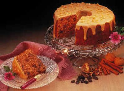 
This photo provided by McCormick shows a Caramel Glazed Cinnamon Raisin Cake, spiced with the warmth of cinnamon, allspice and nutmeg. 
 (Associated Press / The Spokesman-Review)