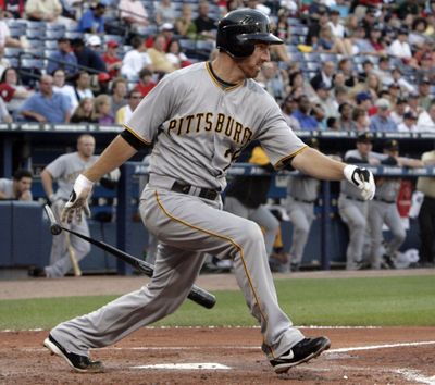 Adam LaRoche was traded for a pair of minor leaguers.  (Associated Press / The Spokesman-Review)