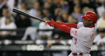 
Cincinnati Reds' Ken Griffey Jr. hits a solo home run Sunday. Associated Press
 (Associated Press / The Spokesman-Review)