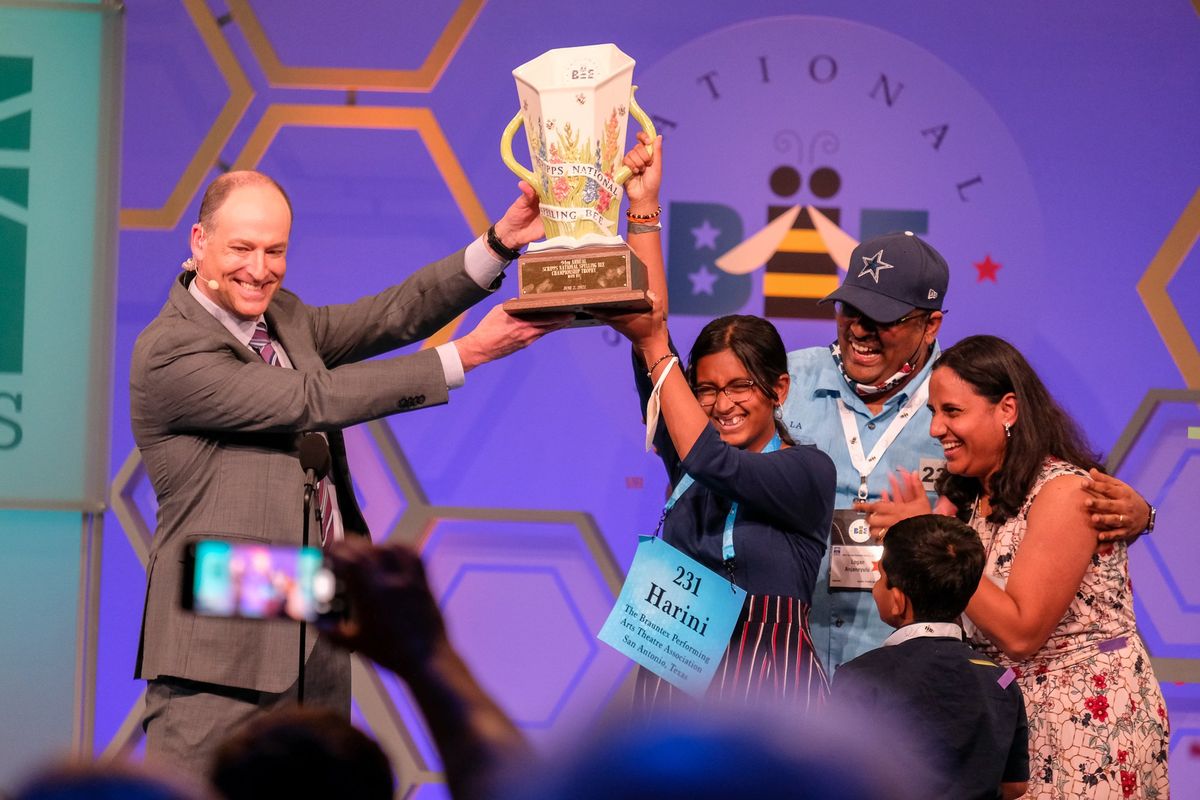 Harini Logan of San Antonio, 14, celebrates with her family after winning the Scripps National Spelling Bee on June 2, 2022, at National Harbor, Maryland.  (Orion Donovan-Smith, The Spokesman-Review)