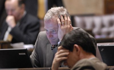 Rep. Reuven Carlyle, D-Seattle, stares at his computer during a late night last week in the Statehouse. Gov. Chris Gregoire said Monday she’ll reconvene lawmakers in a special session.  (RICHARD ROESLER / The Spokesman-Review)