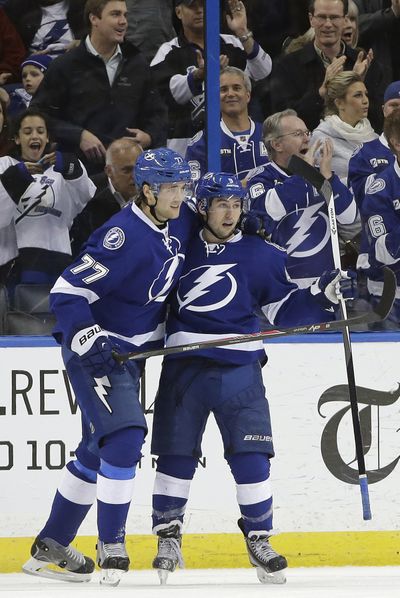 Former Spokane Chiefs center Tyler Johnson, right, celebrates his shorthanded goal to open Tampa Bay’s scoring over Ottawa. (Associated Press)