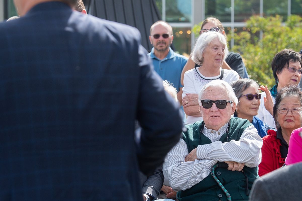 Jack Geraghty, former Spokane County Commissioner and former Spokane Mayor, as well as Expo ’74 organizer, listens to Mayor David Condon speak, Friday, Sept. 13, 2019, at the opening of the Sister Cities Connections Garden in Riverfront Park.  (Jesse Tinsley/The Spokesman-Review)