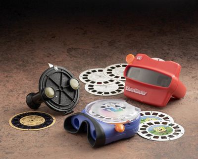 View-Master models that span 65 years of production are seen in this undated display. The earliest model is at the left, and the current model is in the middle.  (File Associated Press / The Spokesman-Review)