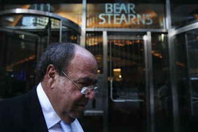 
Steven Raphael, a broker with Bear Stearns, enters the company headquarters in New York on Monday. Associated Press
 (Associated Press / The Spokesman-Review)