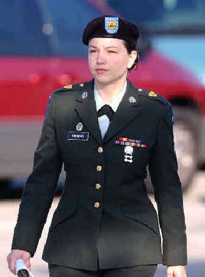 
Spc. Sabrina Harman arrives at the courthouse on Tuesday in Fort Hood, Texas. Harman, 27, was found guilty Monday on six of seven charges for her role in the Abu Ghraib prison abuse in 2003.  
 (Associated Press / The Spokesman-Review)