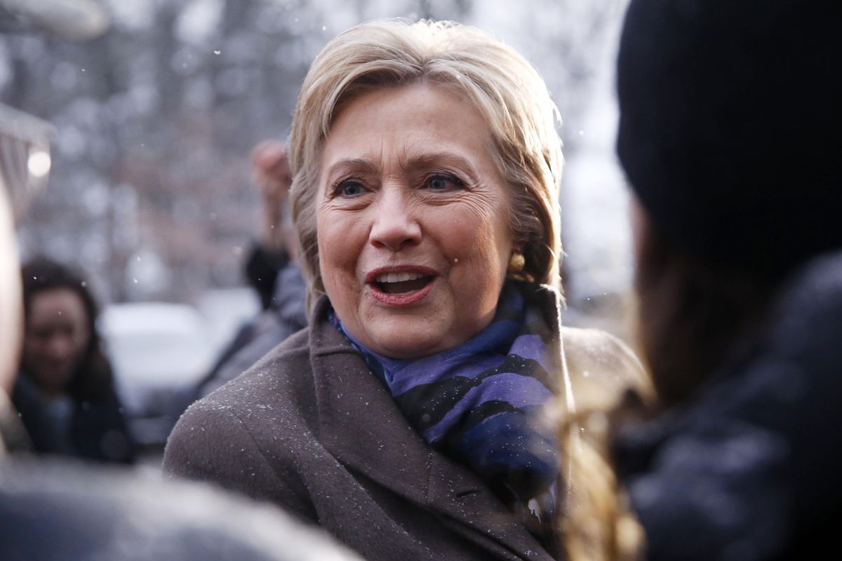 Democratic presidential candidate Hillary Clinton campaigns outside a polling place during the first-in-the-nation presidential primary, Tuesday, Feb. 9, 2016, in Manchester, N.H. (Matt Rourke / Associated Press)