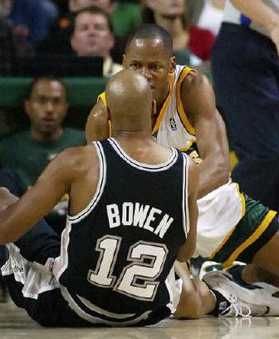 
Seattle's Ray Allen responds after Bruce Bowen apparently kicked him. 
 (Associated Press / The Spokesman-Review)