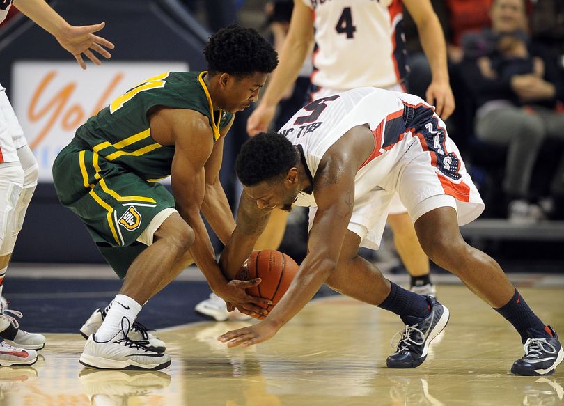 San Francisco’s Devin Watson and GU’s Gary Bell Jr. tussle for ball. (Colin Mulvany)