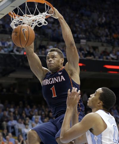 Virginia's Justin Anderson scores two of his 16 points as the No. 3 Cavaliers defeated No. 12 North Carolina 75-64 on Monday. (Associated Press)