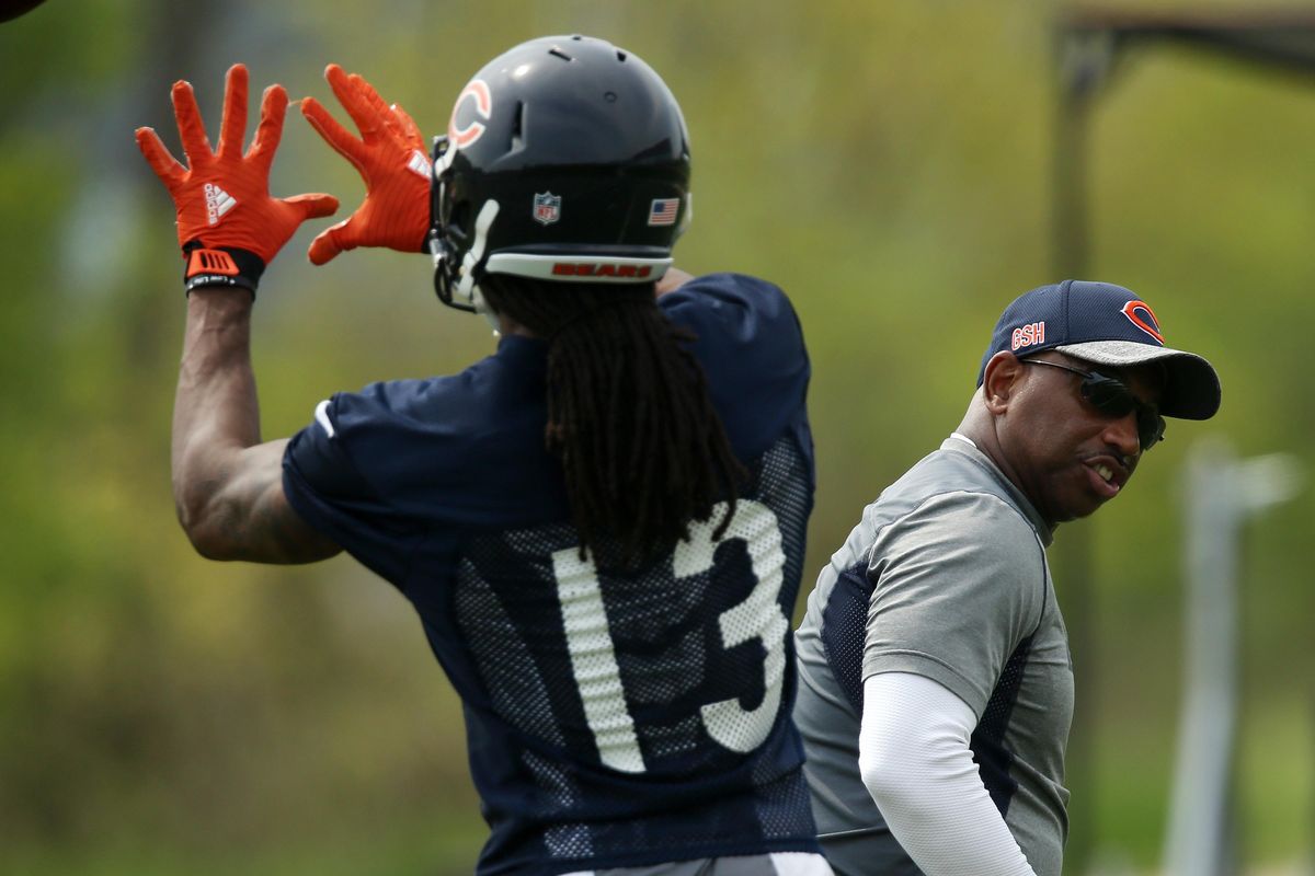 Chicago Bears wide receiver coach Curtis Johnson runs Chicago Bears wide receiver Kevin White though a drill during an OTA practice May 25 at Halas Hall in Lake Forest, Ill. (Anthony Souffle / Anthony Souffle Chicago Tribune)