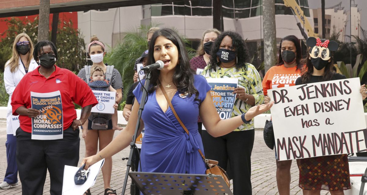 State Rep. Anna Eskamani, D-Orlando, delivers remarks at a protest in front of the Orange County Public Schools headquarters in downtown Orlando, Fla., Monday, Aug. 23, 2021. Teachers, parents and union representatives gathered to demand that the Orange school board adopt a mandatory mask policy because of rising COVID-19 cases, despite an executive order banning school mandates from Florida Gov. Ron DeSantis.  (Joe Burbank)