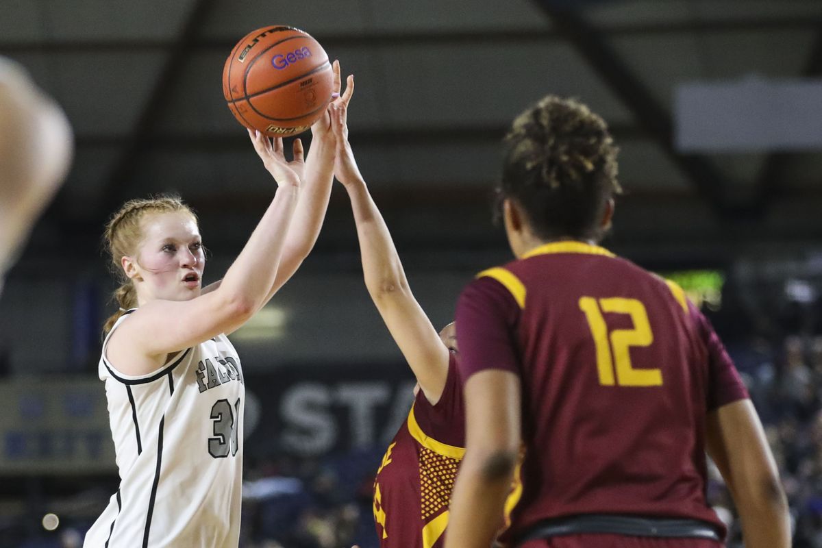 Ridgeline senior Madi Crowley shoots against Lakeside (Seattle) in a State 3A Round-of-12 game on Wednesday at the Tacoma Dome.  (Lauren Smith/VarsityWA)