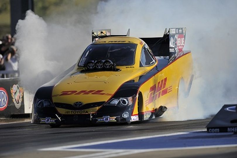 Del Worsham powers his DHL Toyota Camry to the top of the Funny Car qualifying charts at Thunder Valley. (Photo courtesy of NHRA)