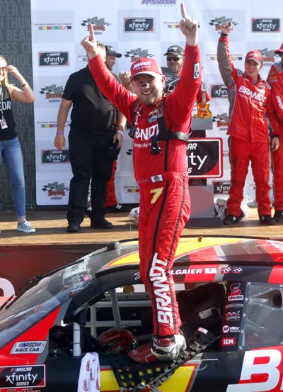 Justin Allgaier celebrates his win in the NASCAR Xfinity Series auto race at Mid-Ohio Sports Car Course in Lexington, Ohio, Saturday, Aug. 11, 2018. (Tom E. Puskar / Associated Press)