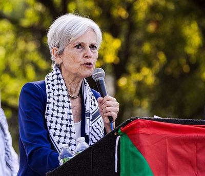 Green Party presidential candidate Jill Stein engages pro-Palestinan protestors as they rally and prepare to march through the streets of Chicago on Aug. 21.  (Dave Decker/ZUMA Press/TNS)