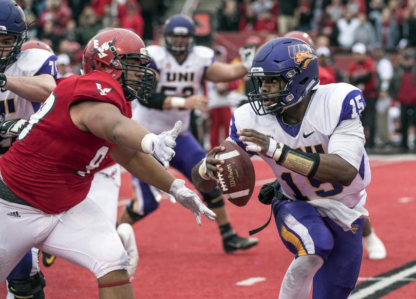 Eastern Washington DL Jay-Tee Tiuli tries to get a glove on Northern Iowa QB Aaron Bailey in the first quarter, Saturday, Sept. 17, 2016, in Cheney. (Dan Pelle / The Spokesman-Review)