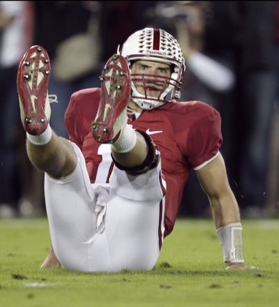 Quarterback Andrew Luck and his No. 3 Stanford Cardinal took a hard tumble against No. 6 Oregon. (Associated Press)