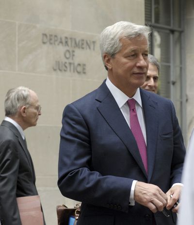 JPMorgan Chase Chairman, President and CEO Jamie Dimon leaves the Justice Department in Washington on Sept. 26. (Associated Press)