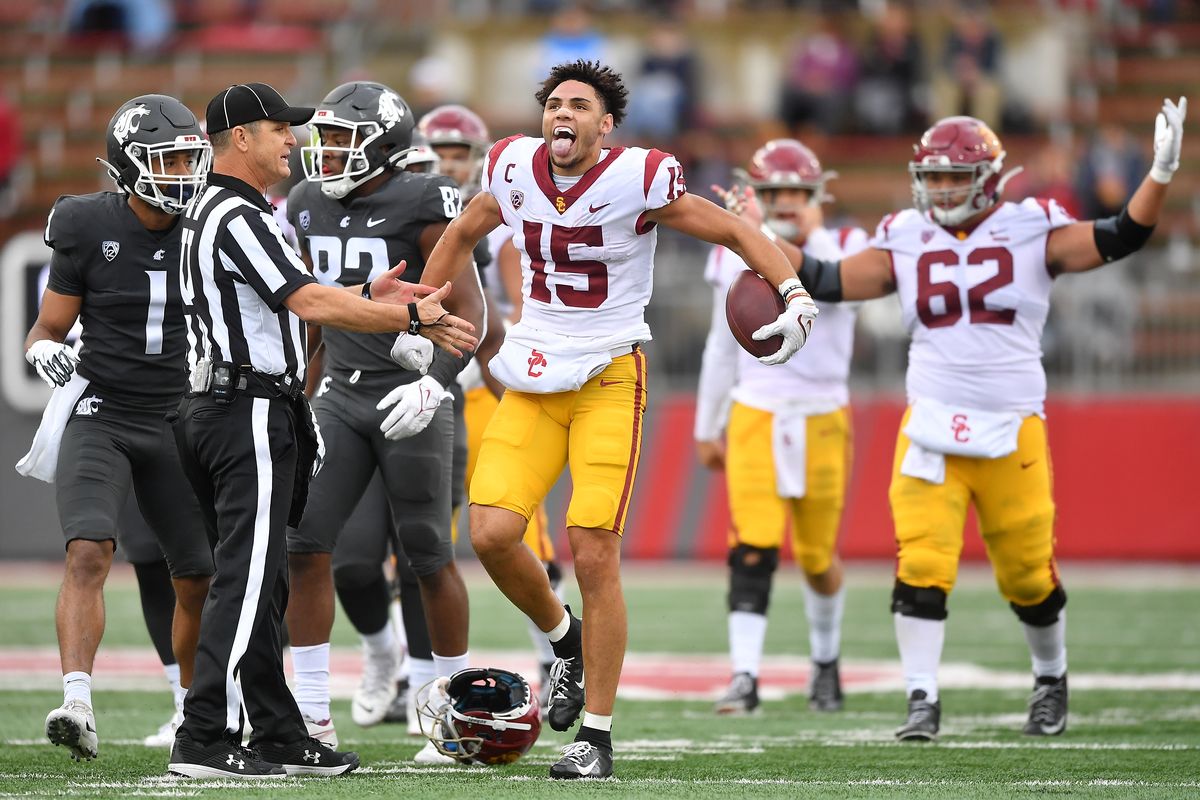 USC Trojans wide receiver Drake London (15) reacts as he stands up after a play where he gained a first down and in the process lost his helmet during the second half where the USC Trojans took control of a college football game against the Washington State Cougars on Saturday, Sep 18, 2021, at Gesa Field in Pullman, Wash. USC won the game 45-14.  (Tyler Tjomsland/The Spokesman-Review)