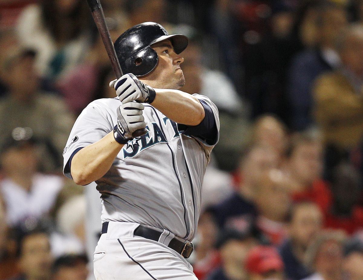 Mariners designated hitter Jack Cust watches his RBI double, breaking a 4-4 tie, in the seventh inning. (Associated Press)