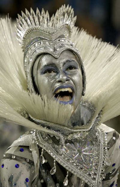 
A reveler participates in the Ponto da Pedra samba school parade at the Sambodrome, Brazil, during carnival 2006.Associated Press
 (Associated Press / The Spokesman-Review)