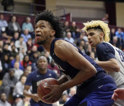 In this Jan. 16, 2017, file photo, Sierra Canyon’s Marvin Bagley III looks to shoot against La Lumiere during a high school basketball game at the 2017 Hoophall Classic in Springfield, Mass. Top recruit Marvin Bagley III’s decision to reclassify and become immediately eligible to play at Duke changed the national championship picture in college basketball. But what does it take to reclassify and go to college early? (Gregory Payan / Associated Press)