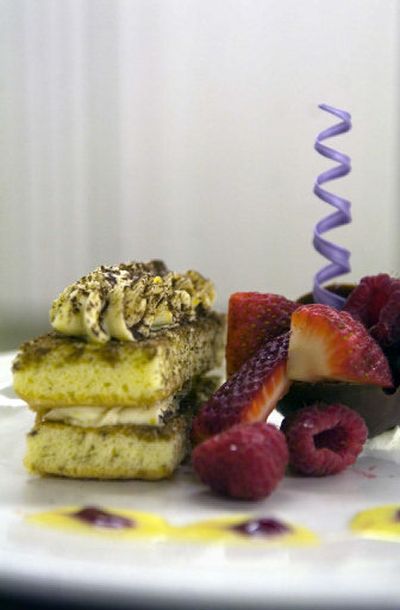 
Karena Burns' dessert: Tiramisu with a miniature chocolate tulip filled with berries and garnished with raspberry sauce, vanilla custard sauce and pulled sugar.
 (Photos by Holly Pickett / The Spokesman-Review)