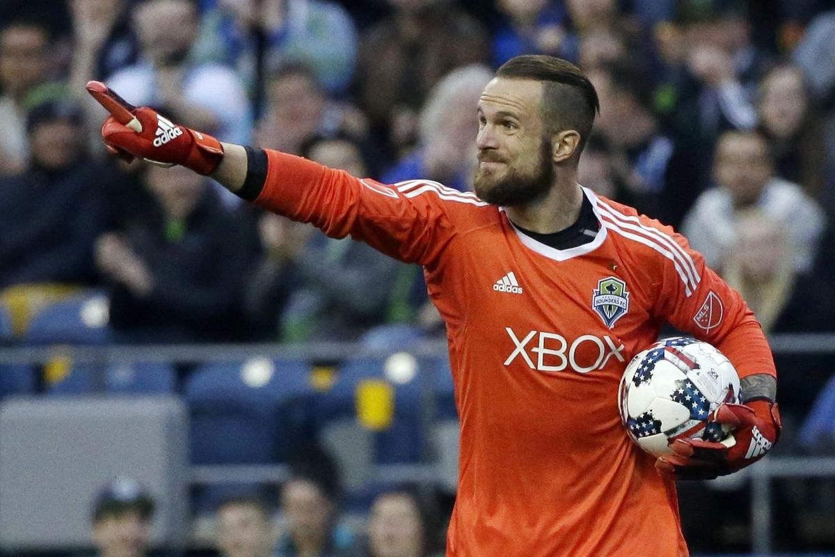In this March 31, 2017, file photo, Seattle Sounders goalkeeper Stefan Frei directs his teammates during an MLS soccer match against Atlanta United in Seattle. Frei has plenty of memories from last December’s MLS Cup. Few top his save on Toronto’s Jozy Altidore that’s now become iconic in Seattle. The two MLS Cup finalists from last season meet for the only time in 2017 this weekend. (Ted S. Warren / Associated Press)