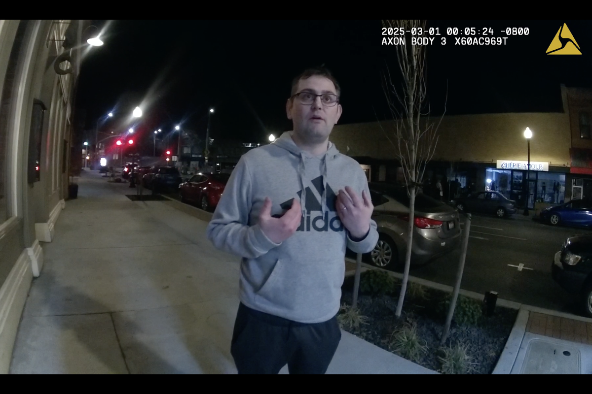 Pullman police officers interview Patrick Mahoney in downtown Pullman after an alleged assault of a Washington State University student, Jay Sani, Feb. 28 on College Hill. Mahoney and his friend, Gerald Hoff, were charged with misdemeanor assault after Mahoney allegedly grabbed the student