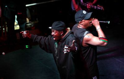 
Public Enemy's Flava Flav, left, shouts out to the crowd while Chuck D.  sings during their concert at the Big Easy on Monday. 
 (Amanda Smith / The Spokesman-Review)