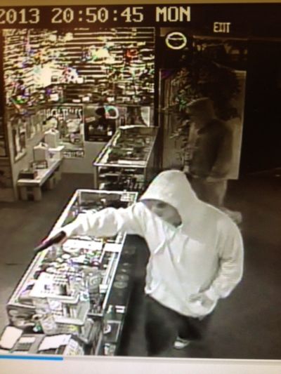 Surveillance video of one of the suspects in the May 27 robbery of Puffin Glass Studio in Spokane Valley.  (Spokane County Sheriff's Office )