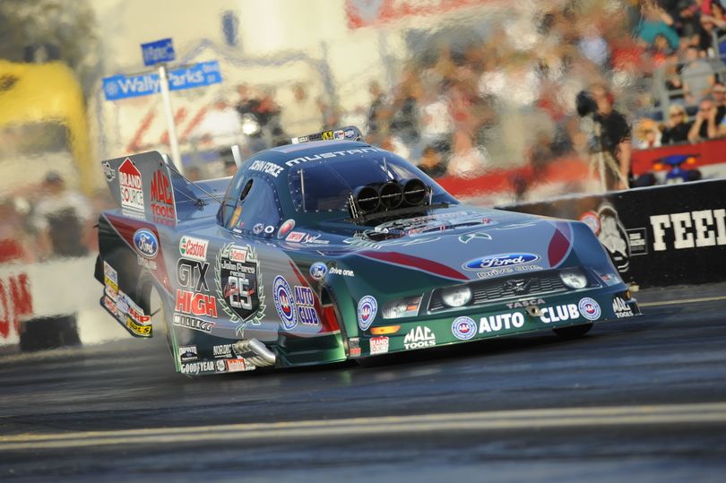 John Force's Castrol Ford Mustang roars to life. (Photo courtesy of NHRA)