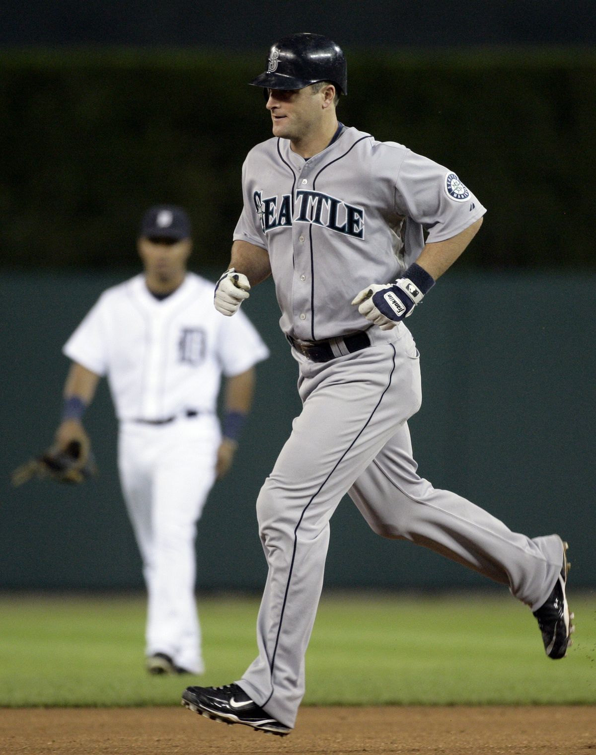 Mariners’ Russell Branyan goes for a jog around the bases after his two-run home run in eighth.  (Associated Press / The Spokesman-Review)