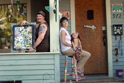Spokane artists Sheera Cunningham and Rebecca LaBelle  pose with some of their creations.  (Brian Plonka / The Spokesman-Review)