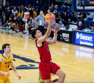 Eastern Washington’s Angelo Allegri rises for a layup as Northern Colorado’s Brock Wisne looks on during Thursday’s Big Sky Conference game in Greeley, Colorado.  (Courtesy of EWU Athletics)