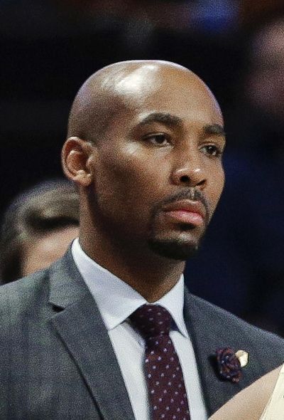 Wake Forest assistant coach Jamill Jones is shown Nov. 28, 2017, during an NCAA basketball game in Winston-Salem, N.C. Police say Jones threw a punch that killed a New York City tourist who knocked on his car window thinking it was his Uber ride. He was arrested Thursday, Aug. 9, 2018, and charged with assault. (Chuck Burton / Associated Press)