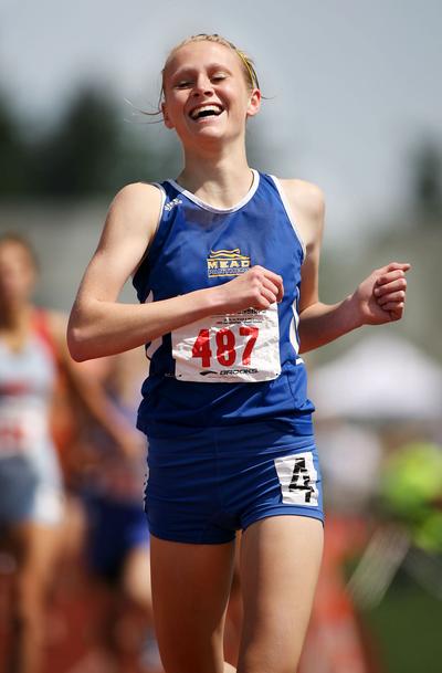 Mead’s Baylee Mires was all smiles as she won the 4A 800 meters, one of three first-place finishes. Special to  (Patrick Hagerty photos Special to / The Spokesman-Review)