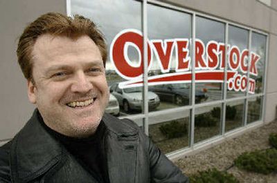 
Overstock.com CEO Patrick Byrne poses outside his company's warehouse and distribution center in Salt Lake City. 
 (Associated Press / The Spokesman-Review)